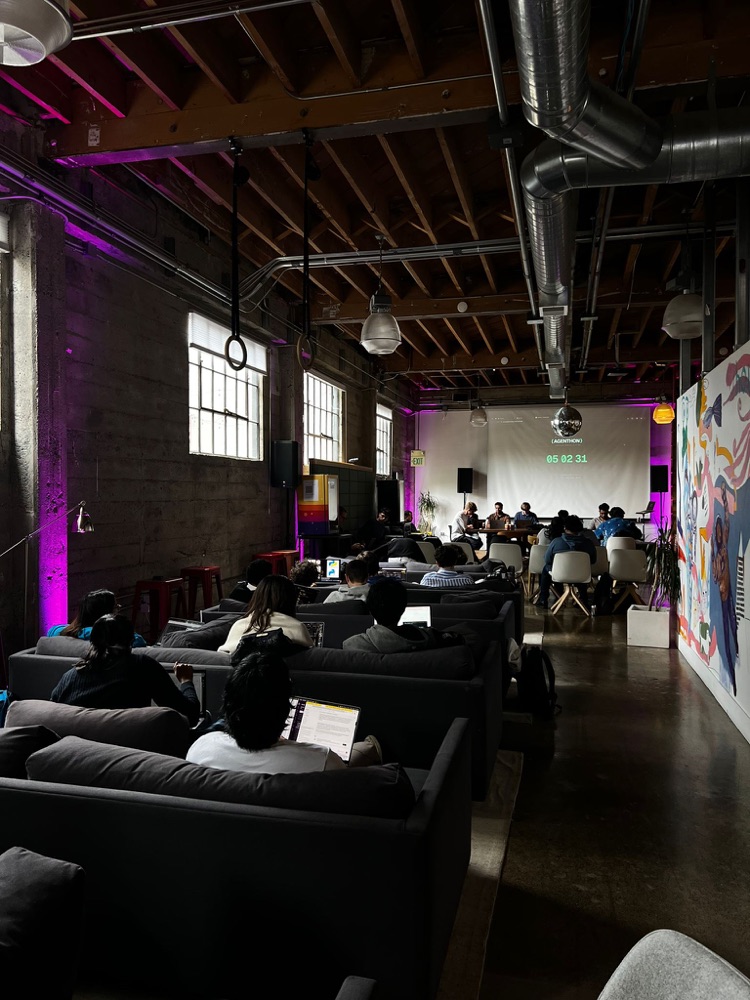 Teams hacking late into the evening with purple lighting